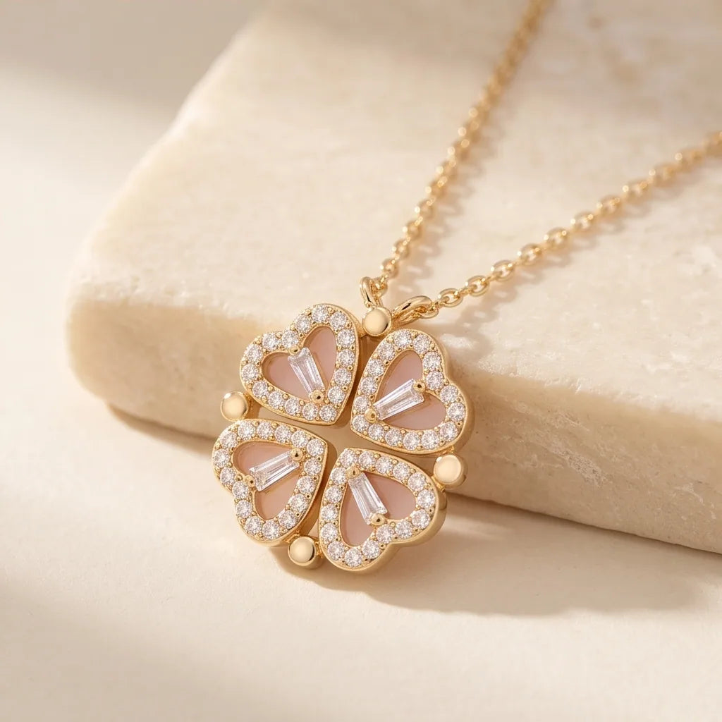The Amour Clover Necklace styled at the neckline